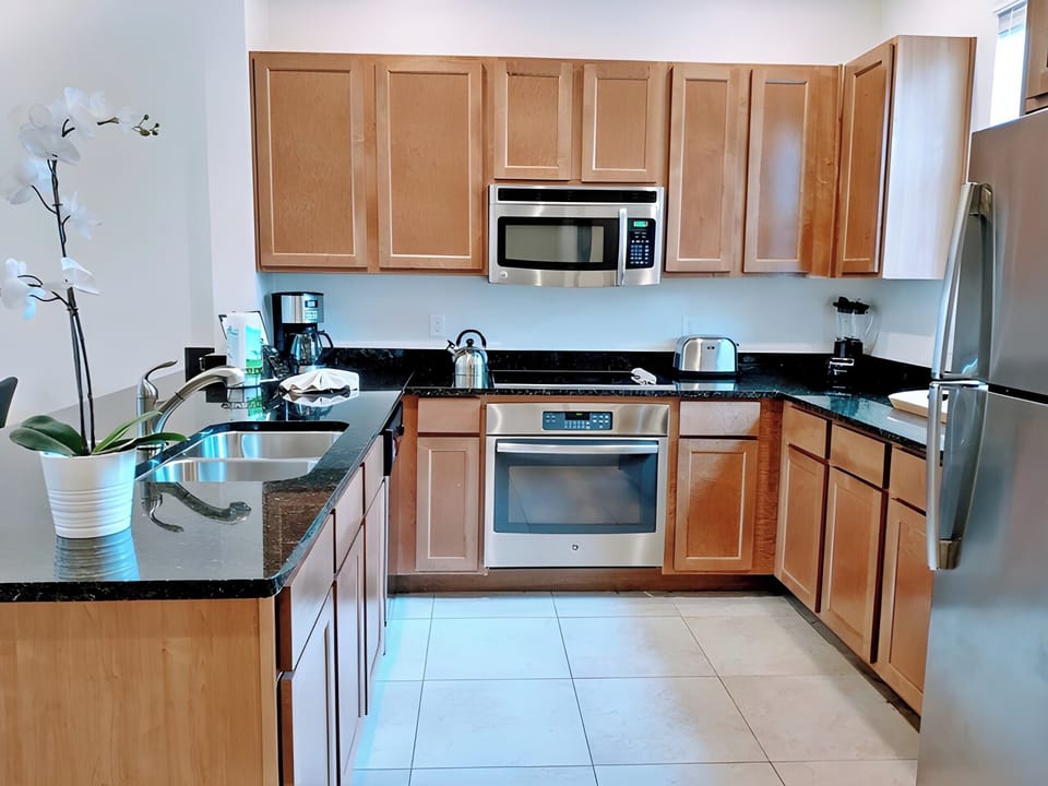 The kitchen is equipped with modern appliances