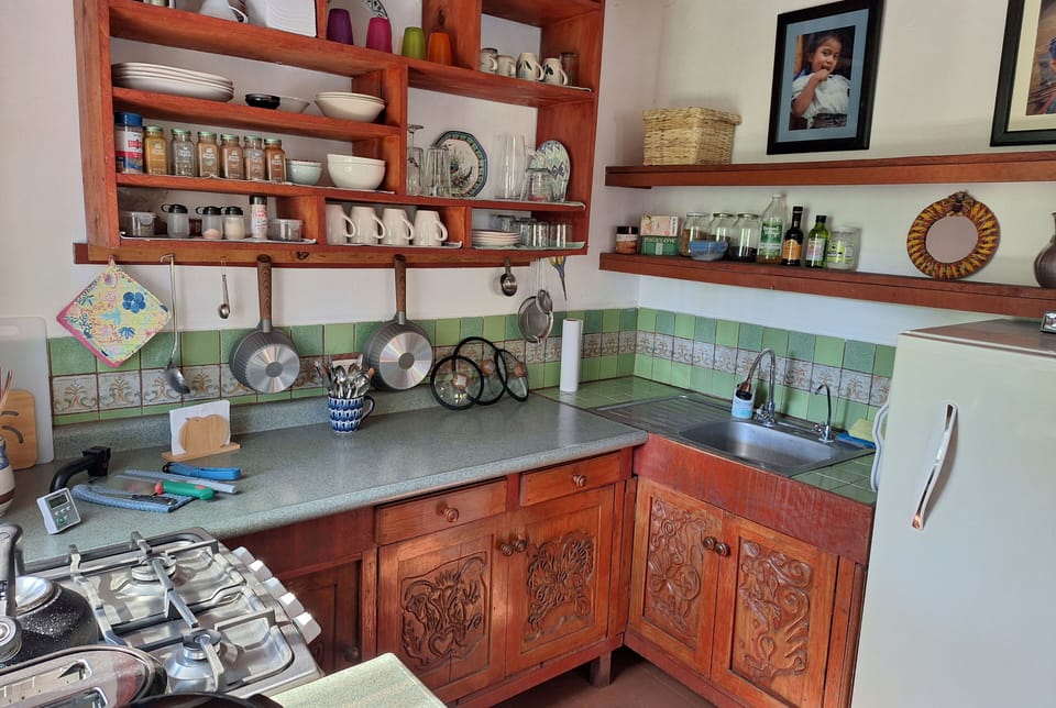 Second view of fully equipped kitchen.