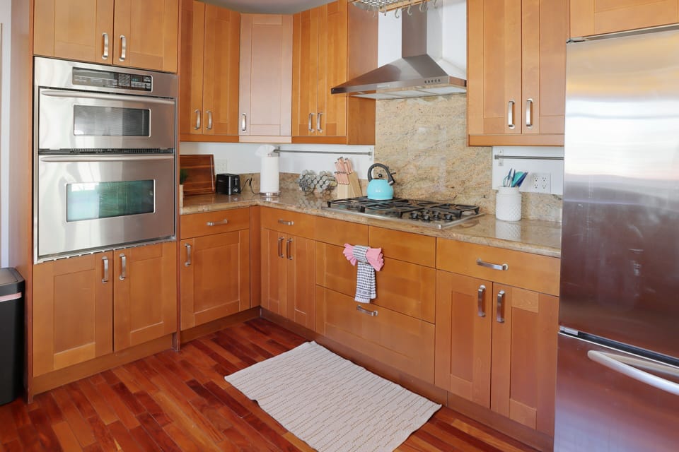 A sleek kitchen with stainless steel appliances