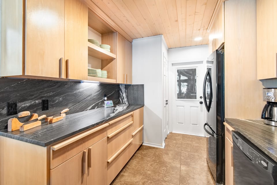 Fully equipped kitchen includes extra full size fridge and pantry