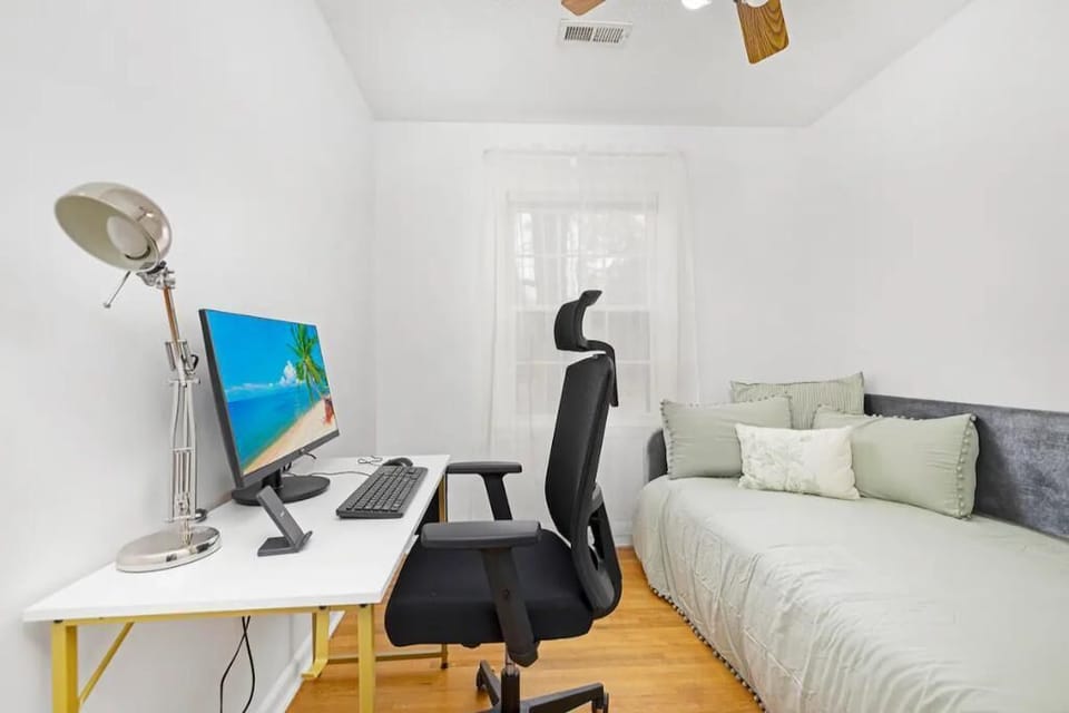 Private work space with monitor, keyboard and mouse. Twin bedroom