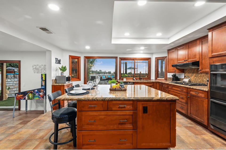 Open layout, natural light, and modern touches make this space an absolute dream