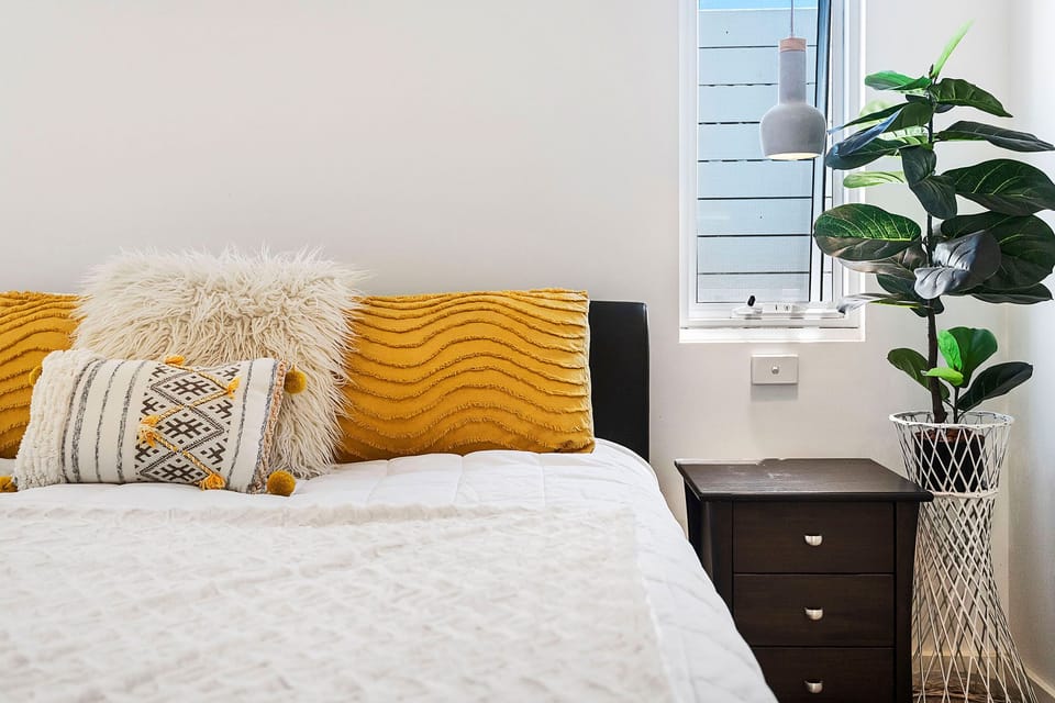 Relax in this cozy bedroom with a comfy bed.