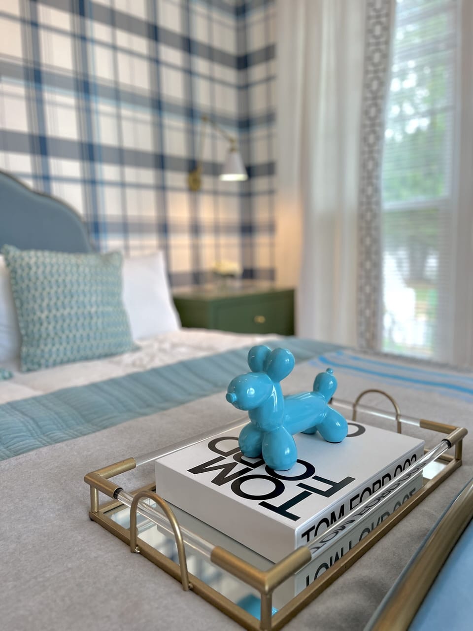 Suite 2: The largest suite with a King Anthropologie bed, seating area, 55" Smart TV, porcelain bath with a jacuzzi tub. Option to adjoin with Suite 1