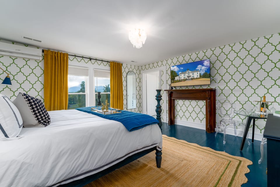 Suite 10: King Anthropologie Bed, stunning views of mountains from all windows, porcelain tile bath with a jacuzzi tub that will have a 360 curtain and shower attachment, 55" Smart TV and no walls adjoin with other suites or living areas
