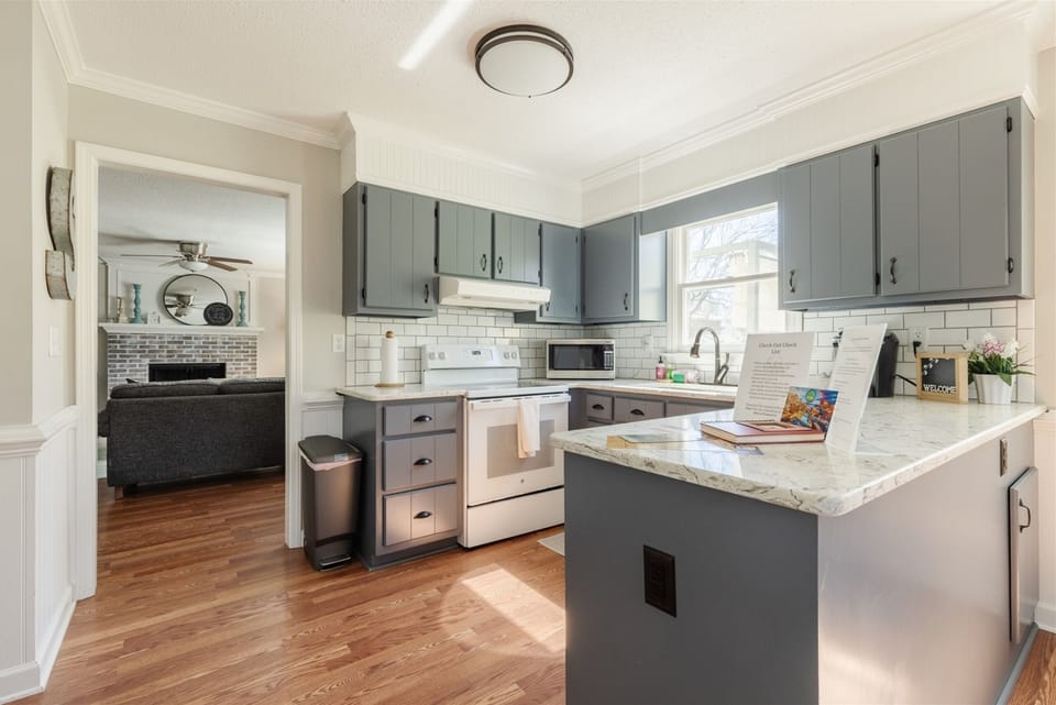 Kitchen with a view into the living room