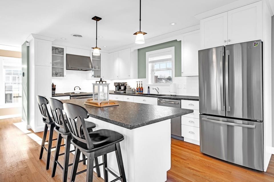Spacious kitchen fully equipped with modern appliances for cooking and dining!