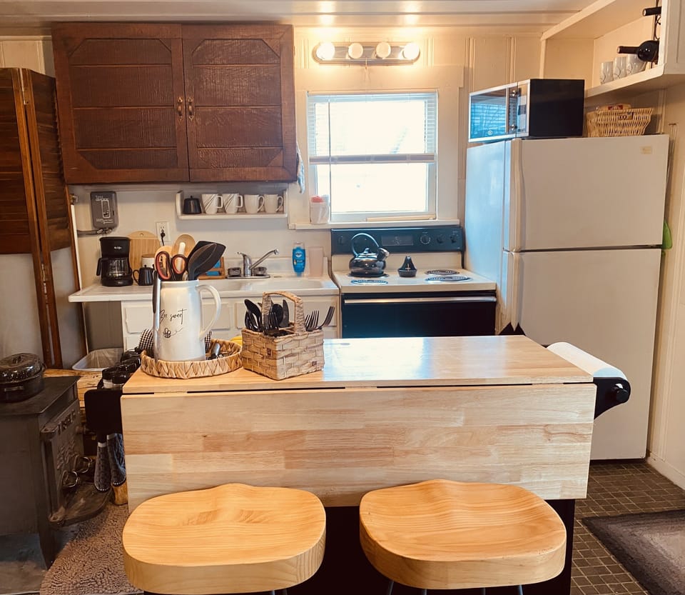 Island expands into a table with bar stools