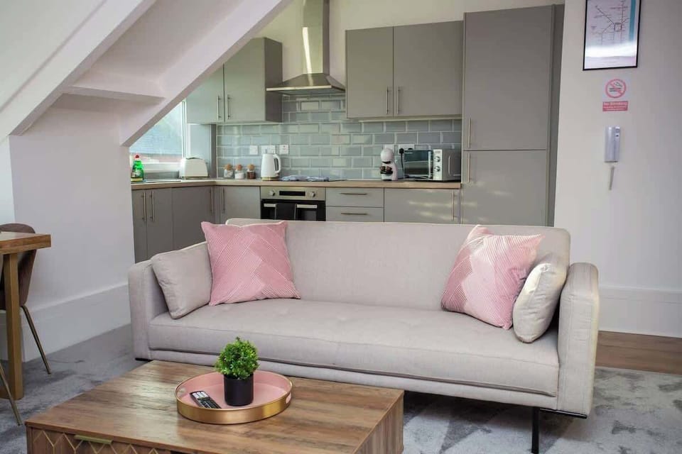 Whether you're enjoying a leisurely morning coffee or unwinding in the evening, this inviting living area provides the perfect backdrop for moments of relaxation and reflection.