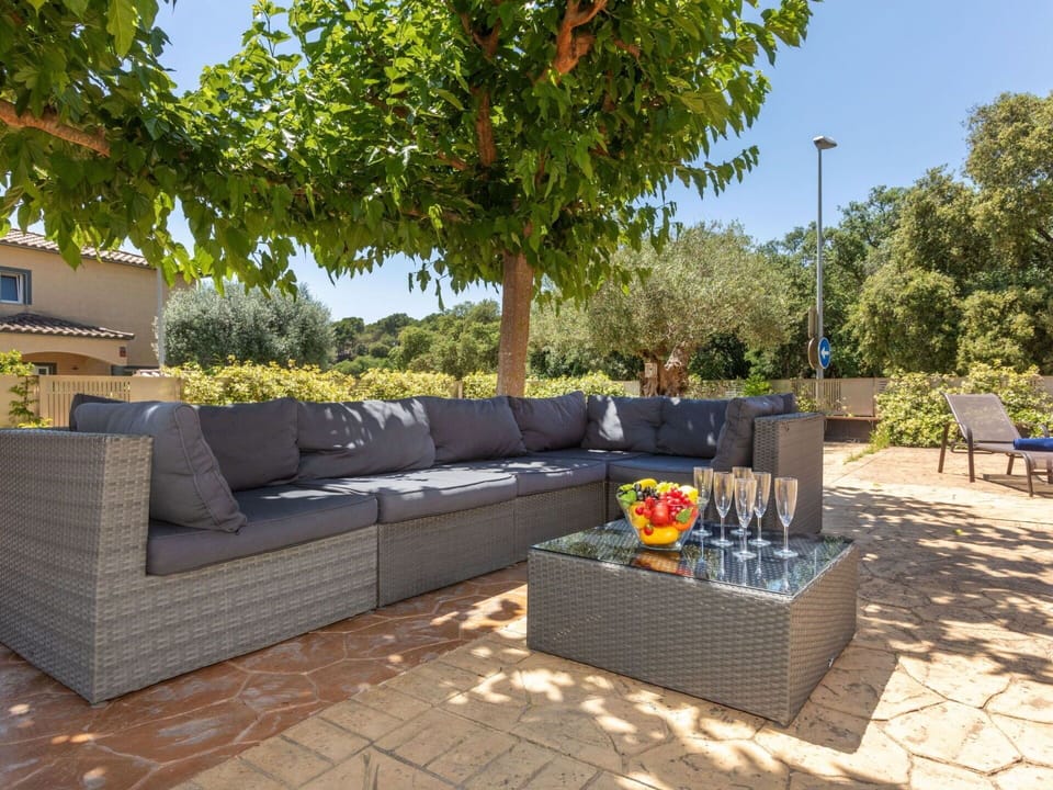 Furniture, Property, Plant, Sky, Couch, Studio Couch, Outdoor Furniture, Interior Design, Flowerpot