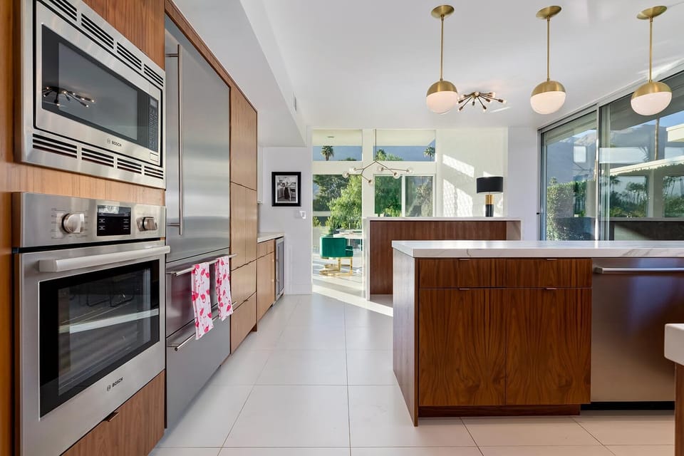 Step into a chef’s paradise in this modern kitchen, where functionality meets style. Equipped with stainless steel appliances, sleek countertops, and ample cabinet space, it invites you to cook and gather with friends and family.