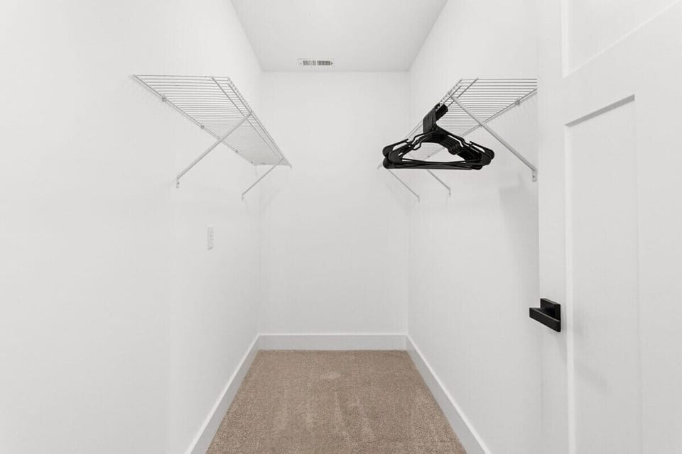 Spacious Walk-In Closet: Ample storage awaits for your wardrobe essentials and travel finds!