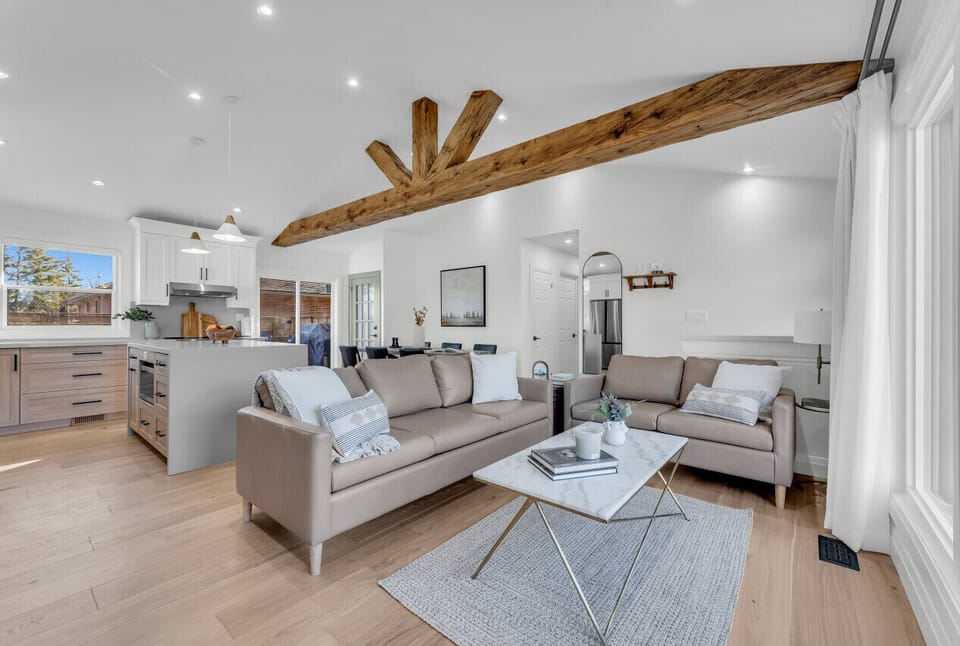 Vaulted ceiling and beautiful rustic beam