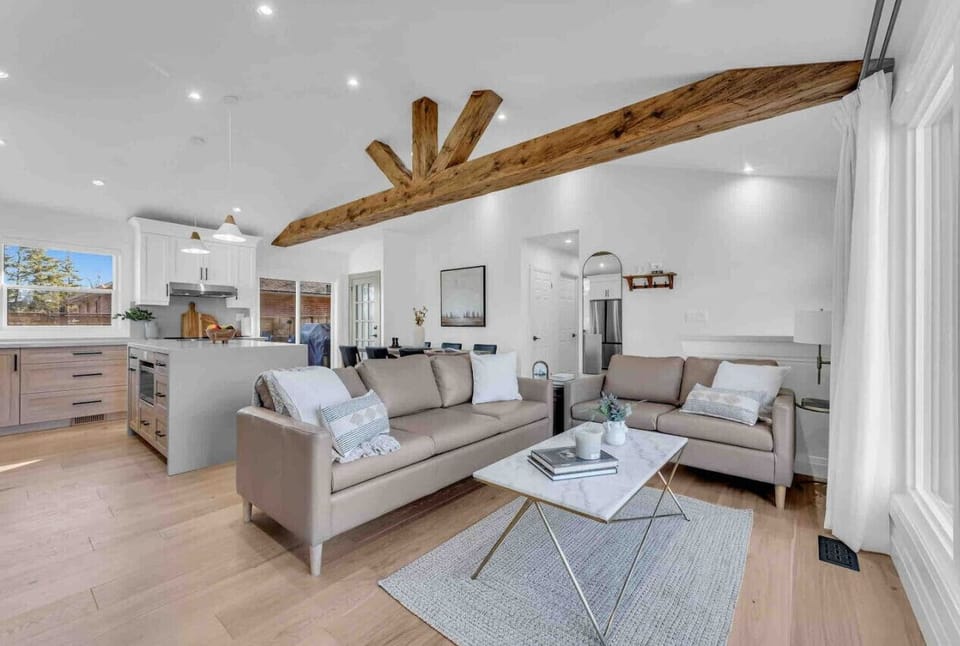 Vaulted ceiling and beautiful rustic beam