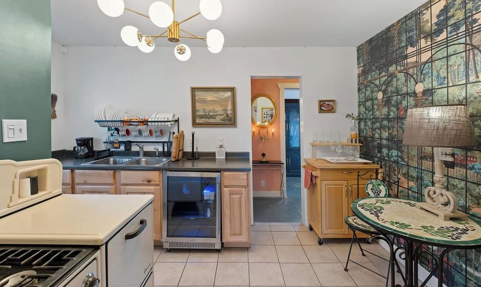 A full-size fridge/freezer & ice maker are just down the stairs from the kitchen
