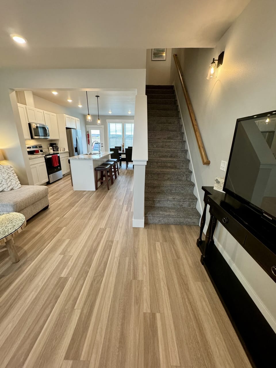 Entry way and entrance up to upstairs bedrooms/ baths & laundry room.