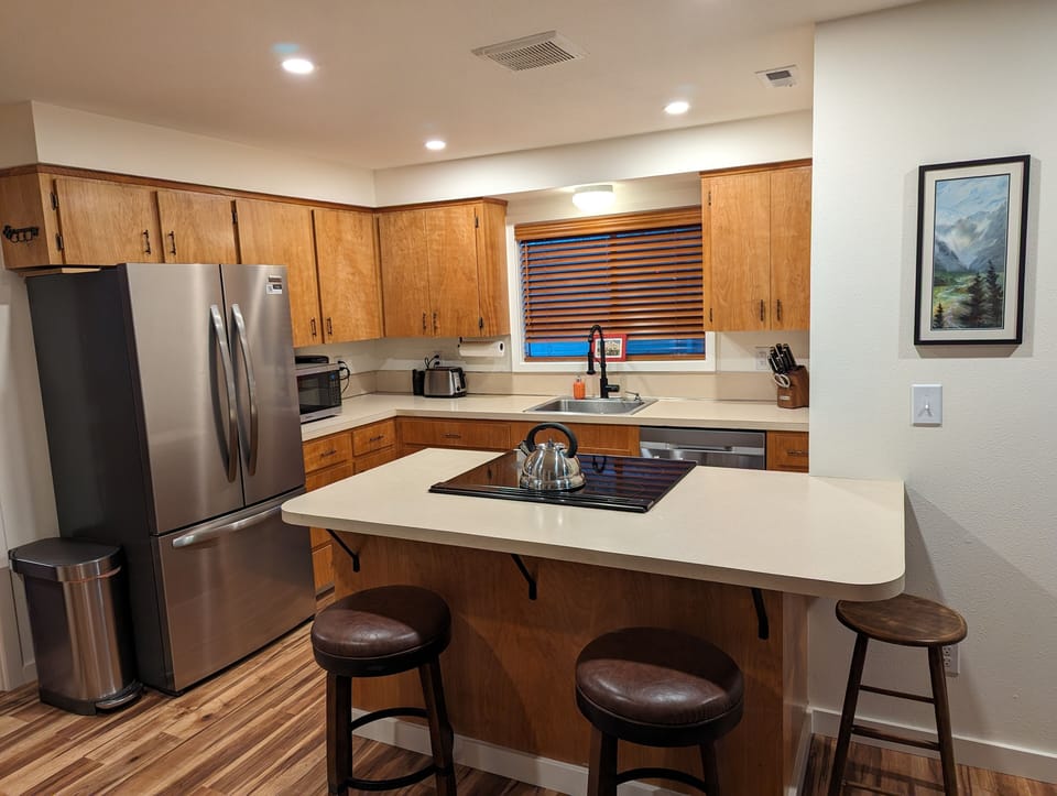 Fully stocked kitchen with new appliances. 