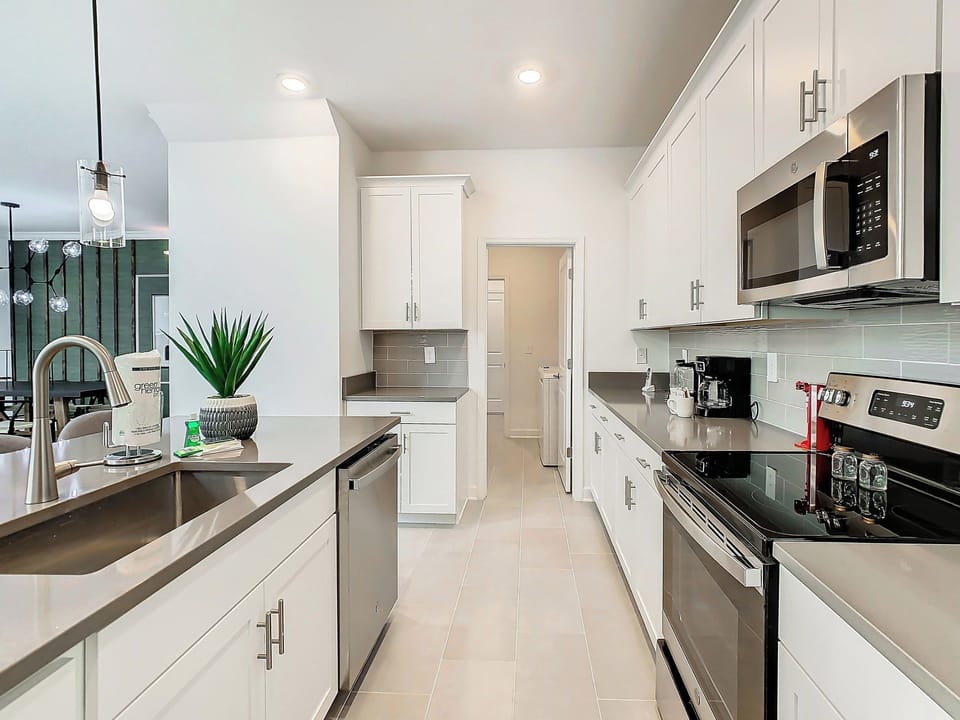Modern kitchen with stainless steel appliances and island