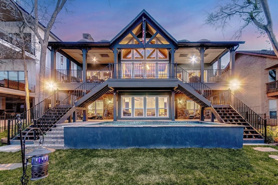 Lots of covered outdoor space, including a dining table and chairs, to hang out and enjoy the view.