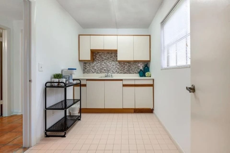 Small Kitchenette attached to 4th Bedroom with sink and personal Keurig