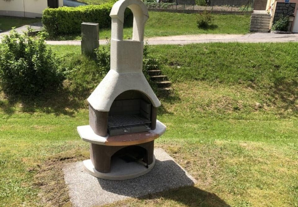 Exterior with terrace, garden and barbecue