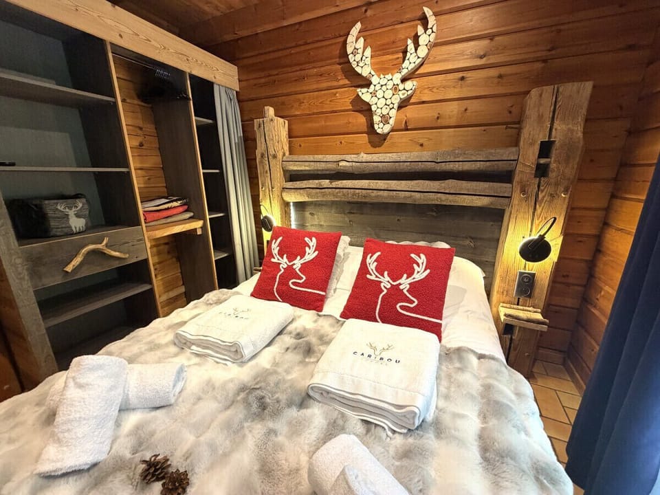 Bedroom with double bed and TV
