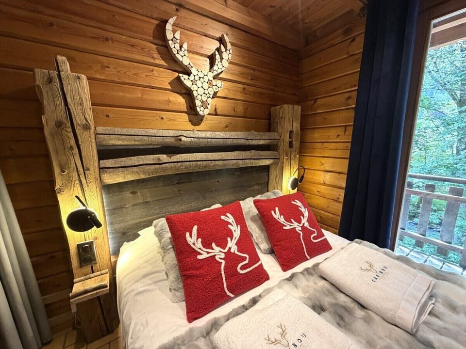 Bedroom with double bed and TV