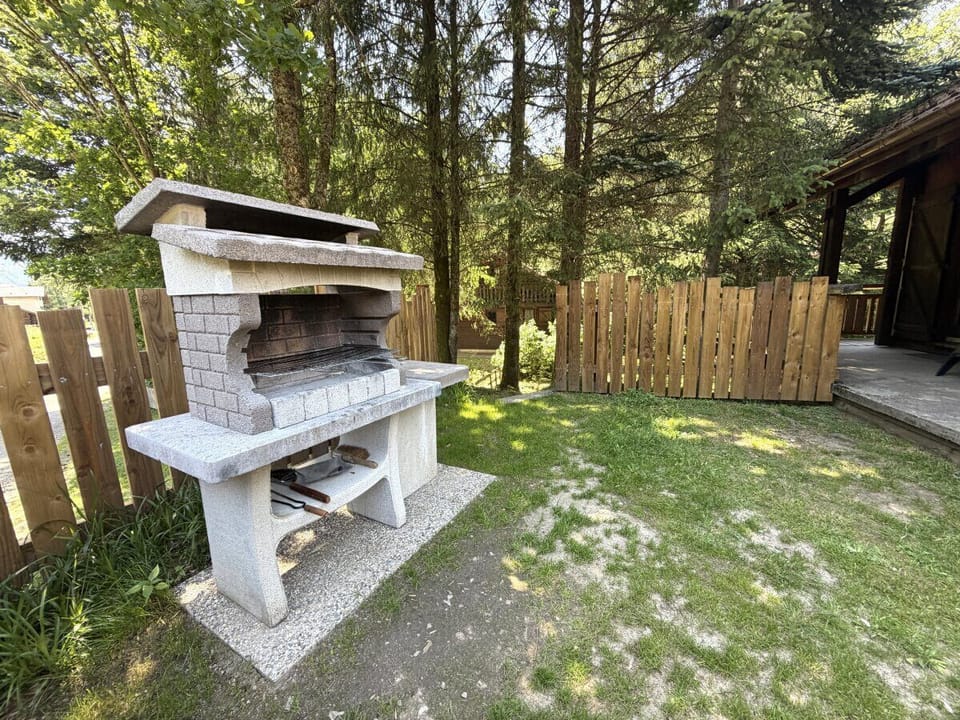 Exterior with terrace, garden and barbecue