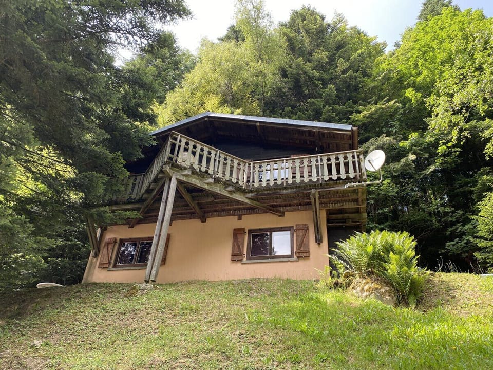 Exterior with balcony and garden