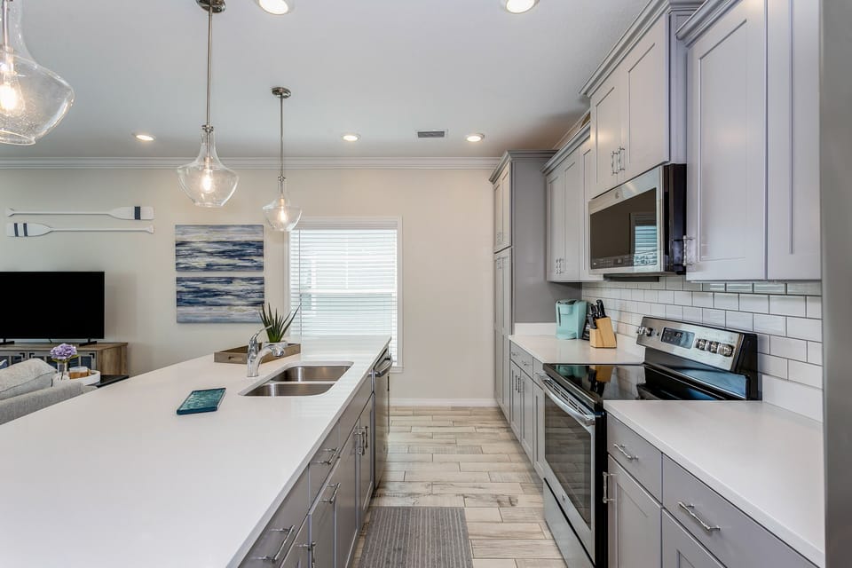 Enjoy our fully stocked kitchen equipped with stainless steel appliances. 