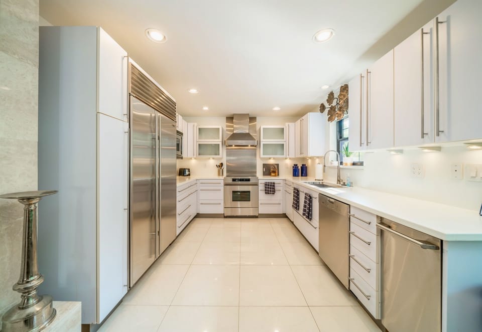 Craft your cuisine in style in our gleaming, modern kitchen—it's a chef's dream!