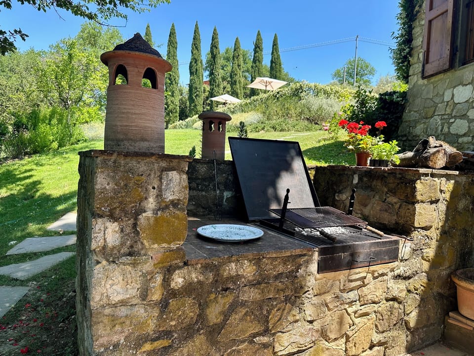 Charcoal or wood grill on terrace