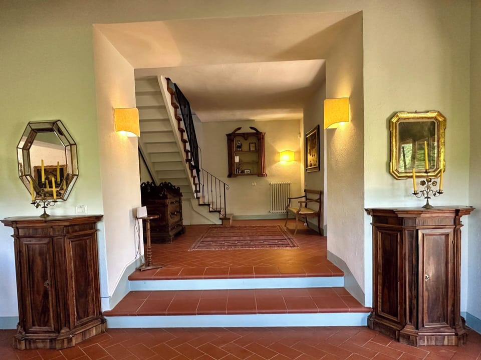 Central hallway leading to  second floor living room and 5 bedrooms