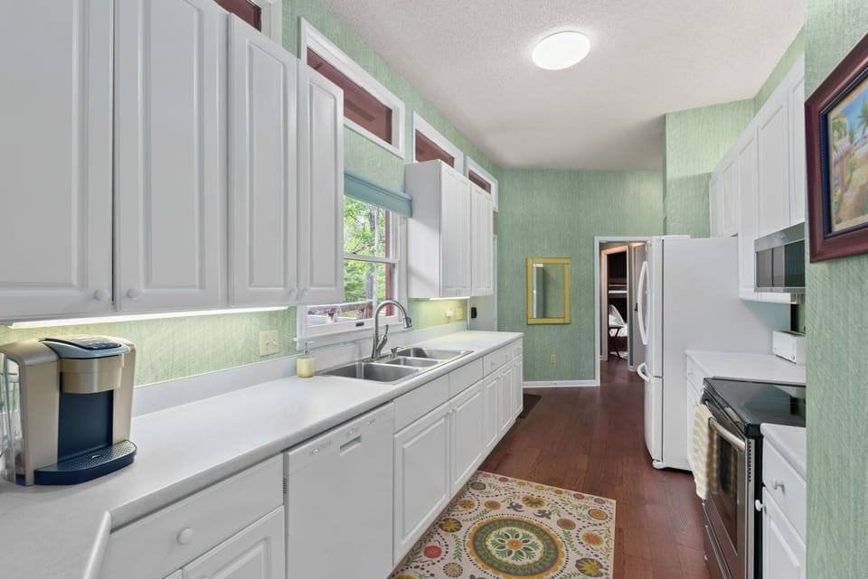 The fully-equipped kitchen has all the basic kitchenware and dishwasher.