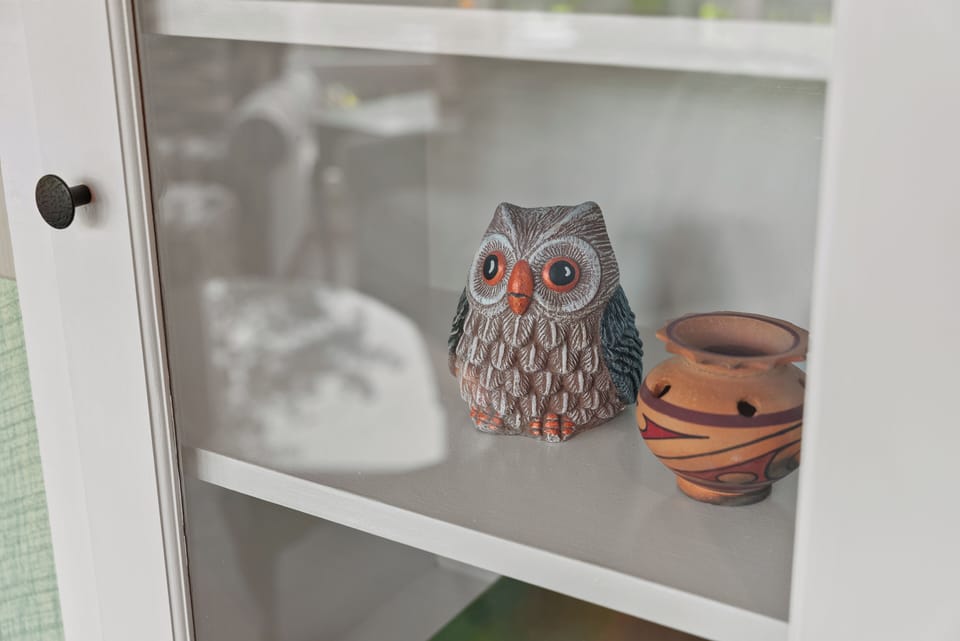 Retro decor adds to the ambiance throughout. Isn't she so cute?!