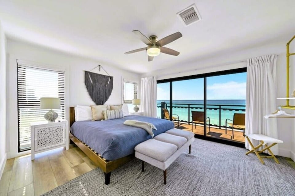 Master king suite located on the 3rd floor with a private balcony on the beach! 