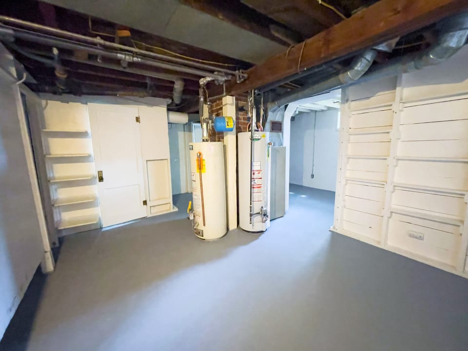The partially finished basement can be used for storage or extra space.