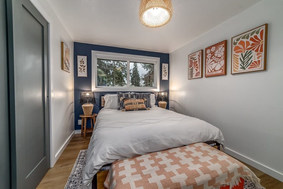 Bedroom 2 features Nectar queen mattress, dresser and standing fan
