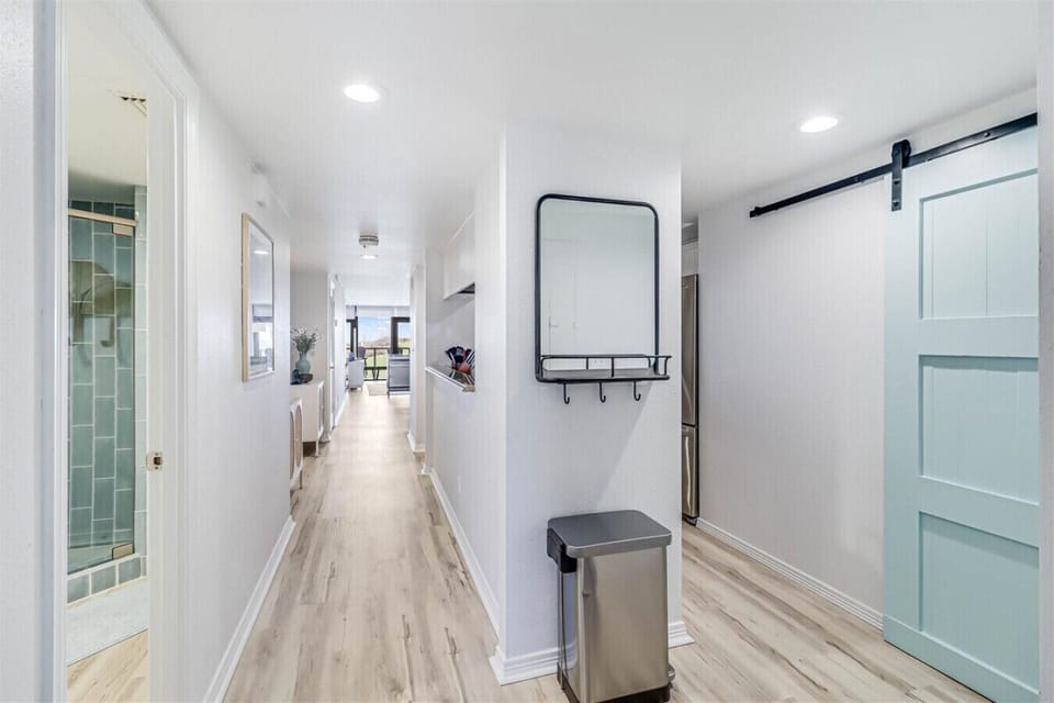 Welcoming entryway leads through the heart of the condo