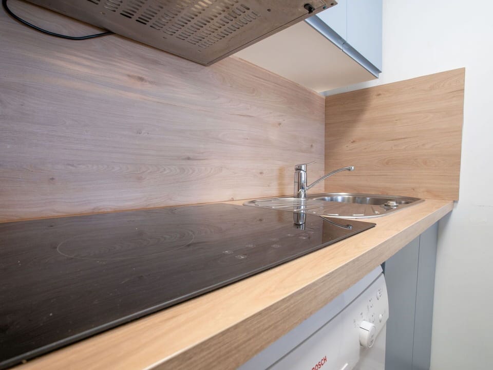 Countertop, Cabinetry, Building, Tap, Plumbing Fixture, Sink, Kitchen Sink, Kitchen, Wood, Interior Design