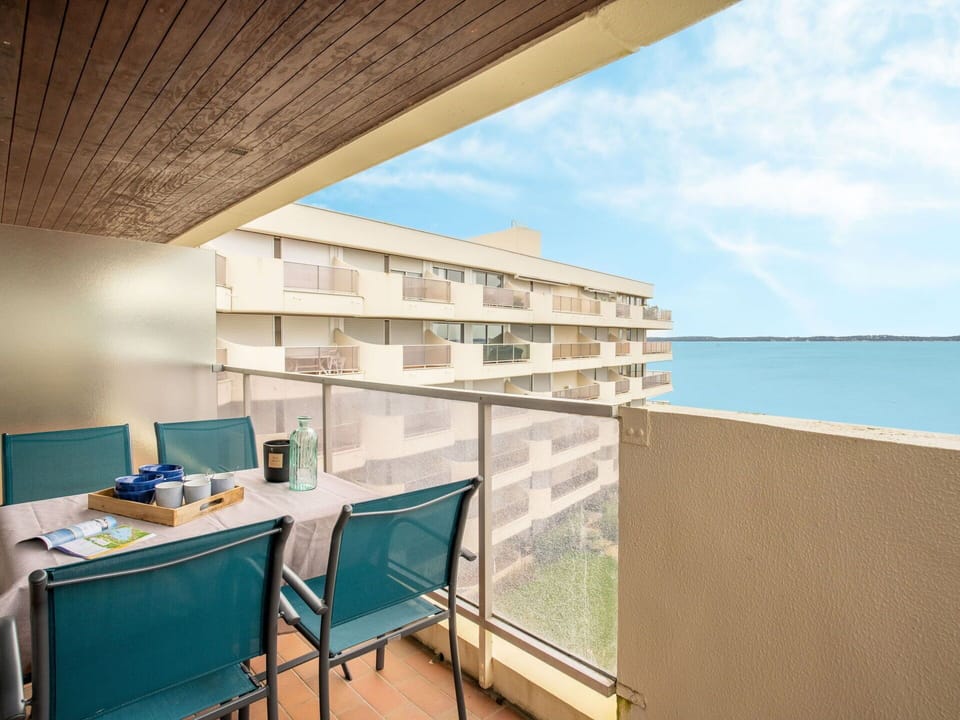 Building, Furniture, Sky, Water, Azure, Cloud, Table, Desk, Interior Design, Wood