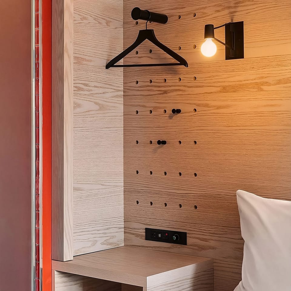 Unwind in a cozy bedroom nook with warm ambient lighting.