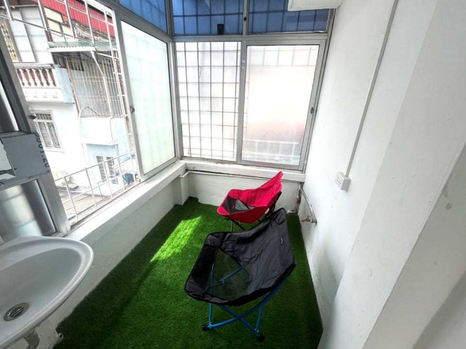 a small space for chilling and relaxing, can view the train top, next to bedroom