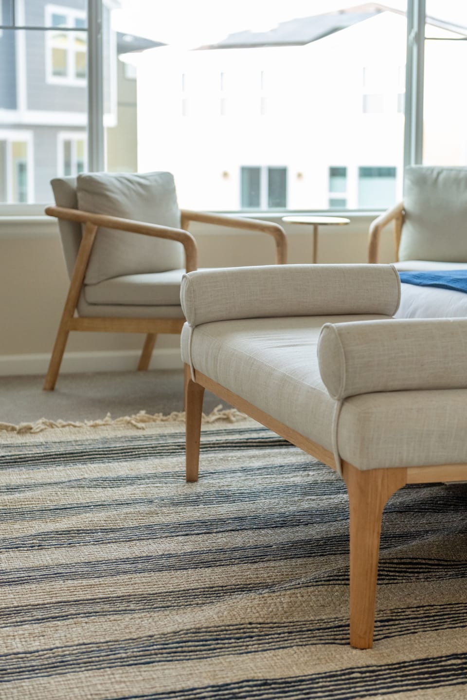 Plush end stool and seating area for the bedroom