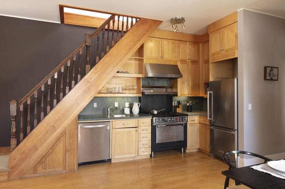 Historic kitchen with modern touches and warm inviting atmosphere.