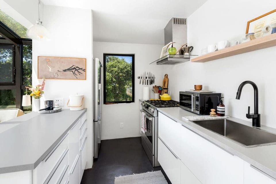 Pristine and Well-Equipped Kitchen with with Everything You Need
