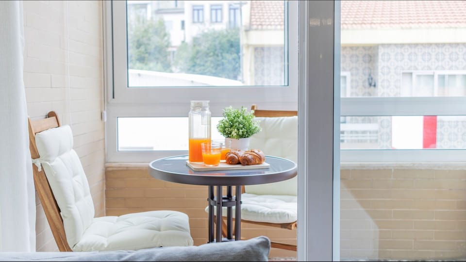 Create unforgettable memories on our balcony, sharing meals and conversations at a charming small table. #UnforgettableMoments #CharmingTable