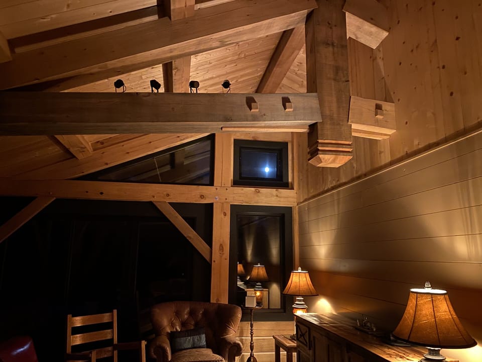 Roof truss at night in the main living room
