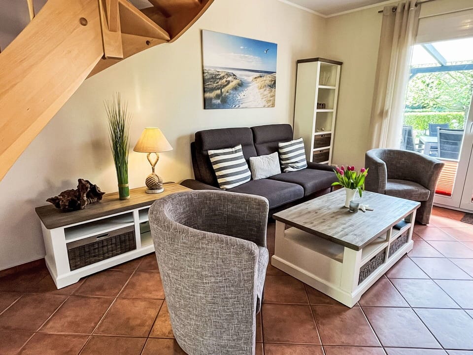 Furniture, Interior Design, Flooring, Wood, Living Room, Floor, Chair, Couch, Room, Table