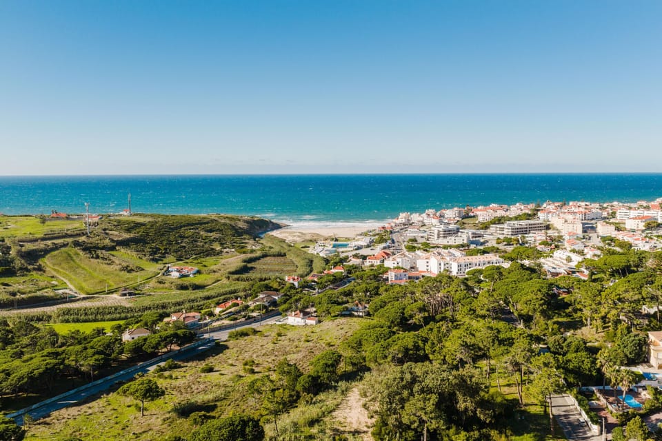 Aerial coastal landscape with beach and seaside town — Villa Latina, holiday villa in Sintra